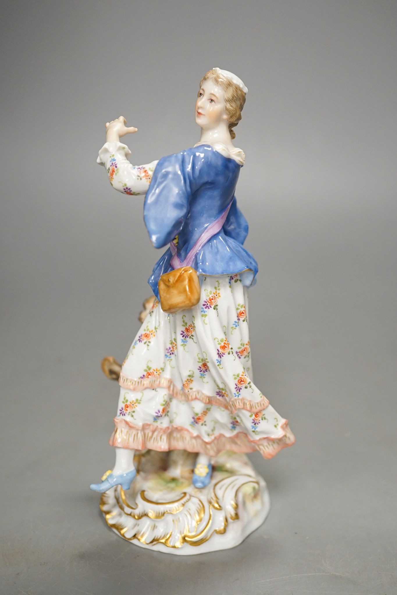 A Meissen figure of a lady, incised model 1984. 18cm tall